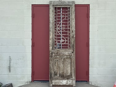 Paneled Wood Door with Decorative Iron Insert