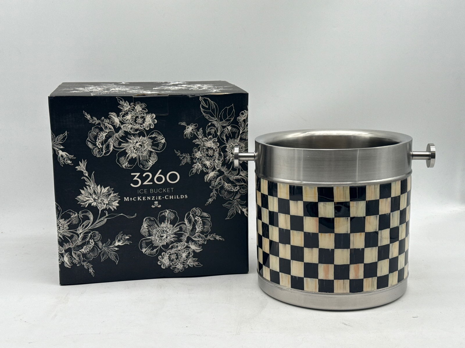 MacKenzie-Childs Courtly Check Ice Bucket: A MacKenzie-Childs Courtly Check ice bucket with original box. 7in tall x 9in wide. | You have additional shipping options, and are not required to use Live Shipping. Additional third-party shipper de