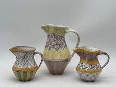 Three MacKenzie-Childs Ceramic Pitchers