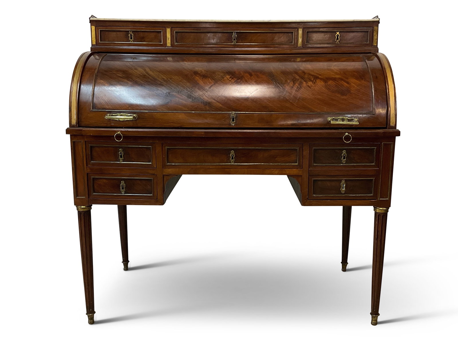 French Mahogany Louis XVI-style Cylinder Desk: A French mahogany Louis XVI-style cylinder desk with ormolu mounts and three interior faux lower drawers. Provenance: This desk belonged to and was used by Robert Montgomery Scott. From the home of th
