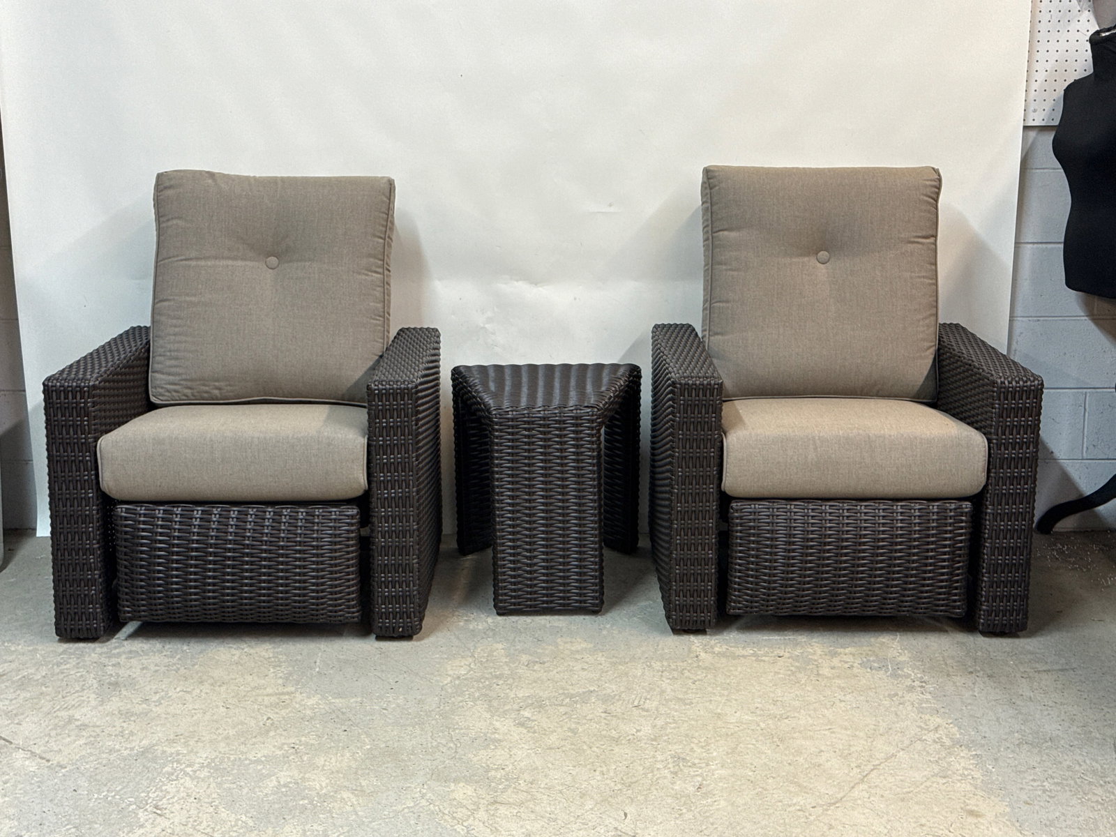 Pair of Barcalounger Patio Recliners: A pair of Barcalounger resin wicker patio reclining lounge chairs with a side table. Chairs: 41in tall x 33in wide x 32in deep. | You have additional shipping options, and are not required to use Live