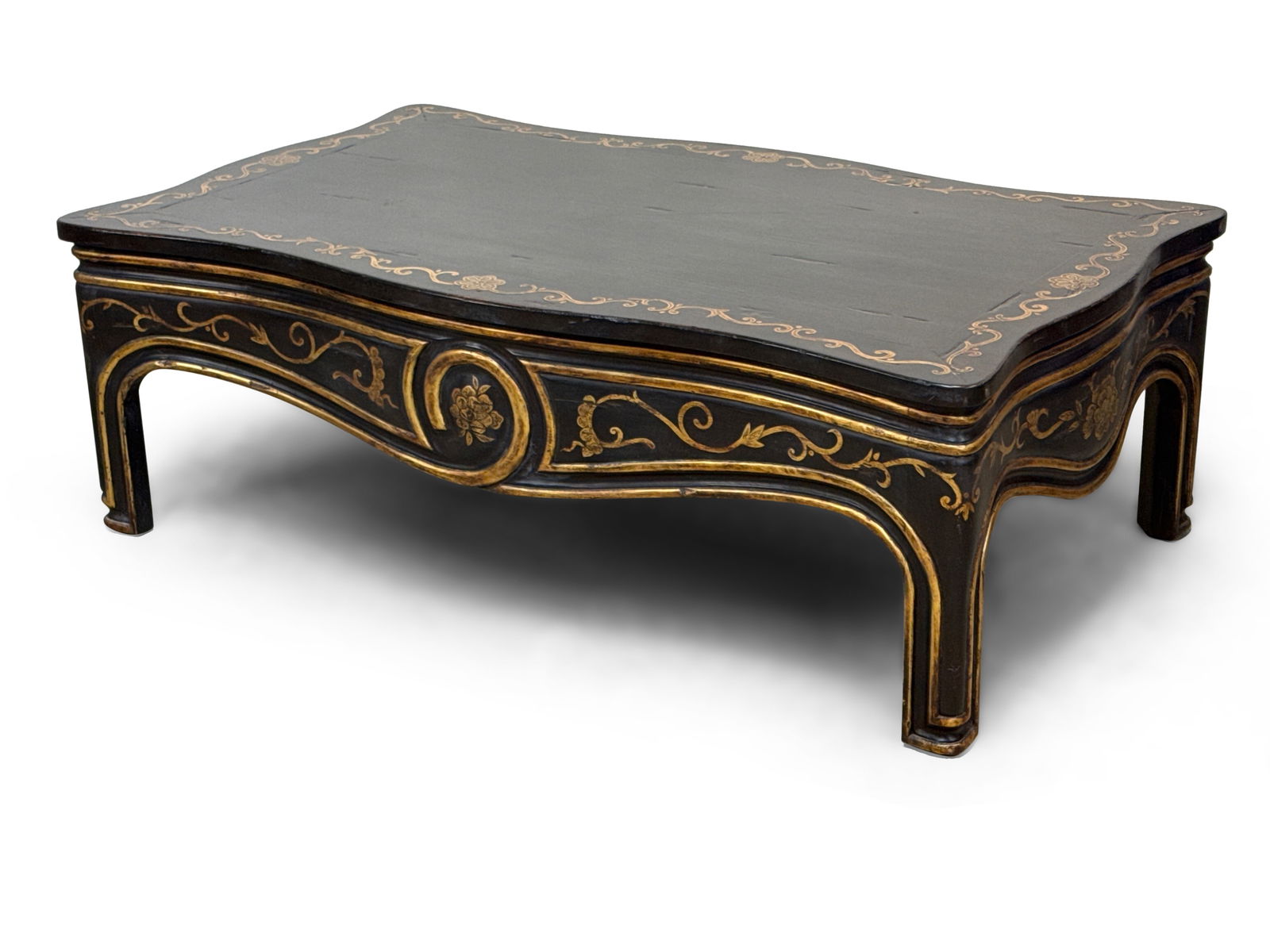 Nancy Corzine Cocktail Table: A Nancy Corzine ebonzed and gilt decorated cocktail coffee table. Provenance: From a Rittenhouse Square, Philadelphia apartment designed by interior designer Barbara Eberlein. 18in tall x 54in wide x