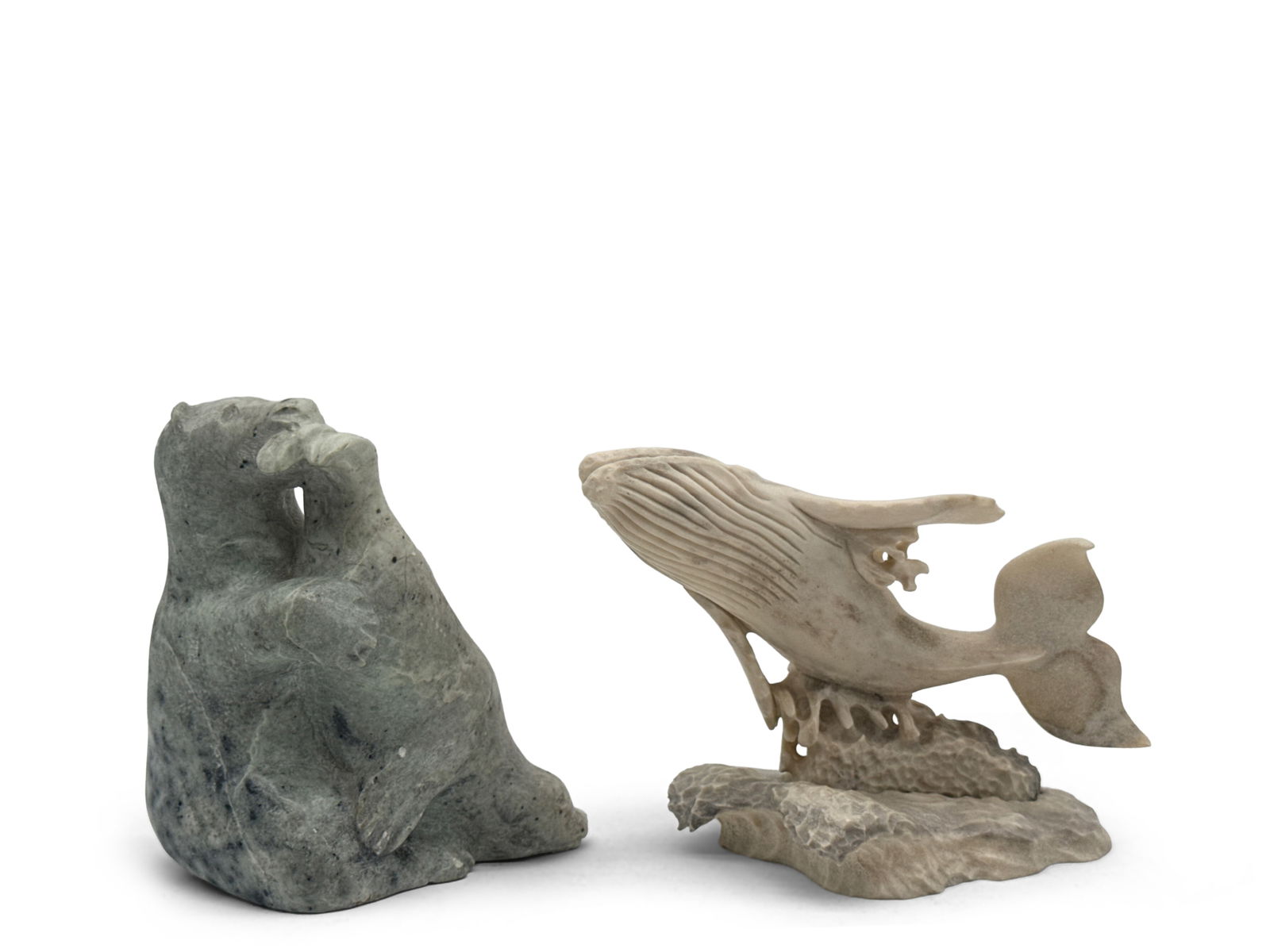Two Inuit Stone Sculptures: A Sheldon Richards signed whale soapstone figure and an Inuit carved soapstone figure of a polar bear attacking a seal. Larger: 4-1/2in tall x 6in wide. | You have additional shipping options, and are