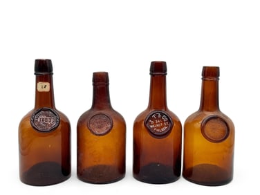 Four JT & Co. Philadelphia Amber Whiskey Bottles
