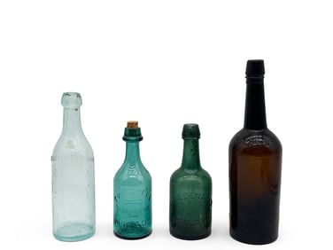 Four Early Philadelphian Glass Bottles