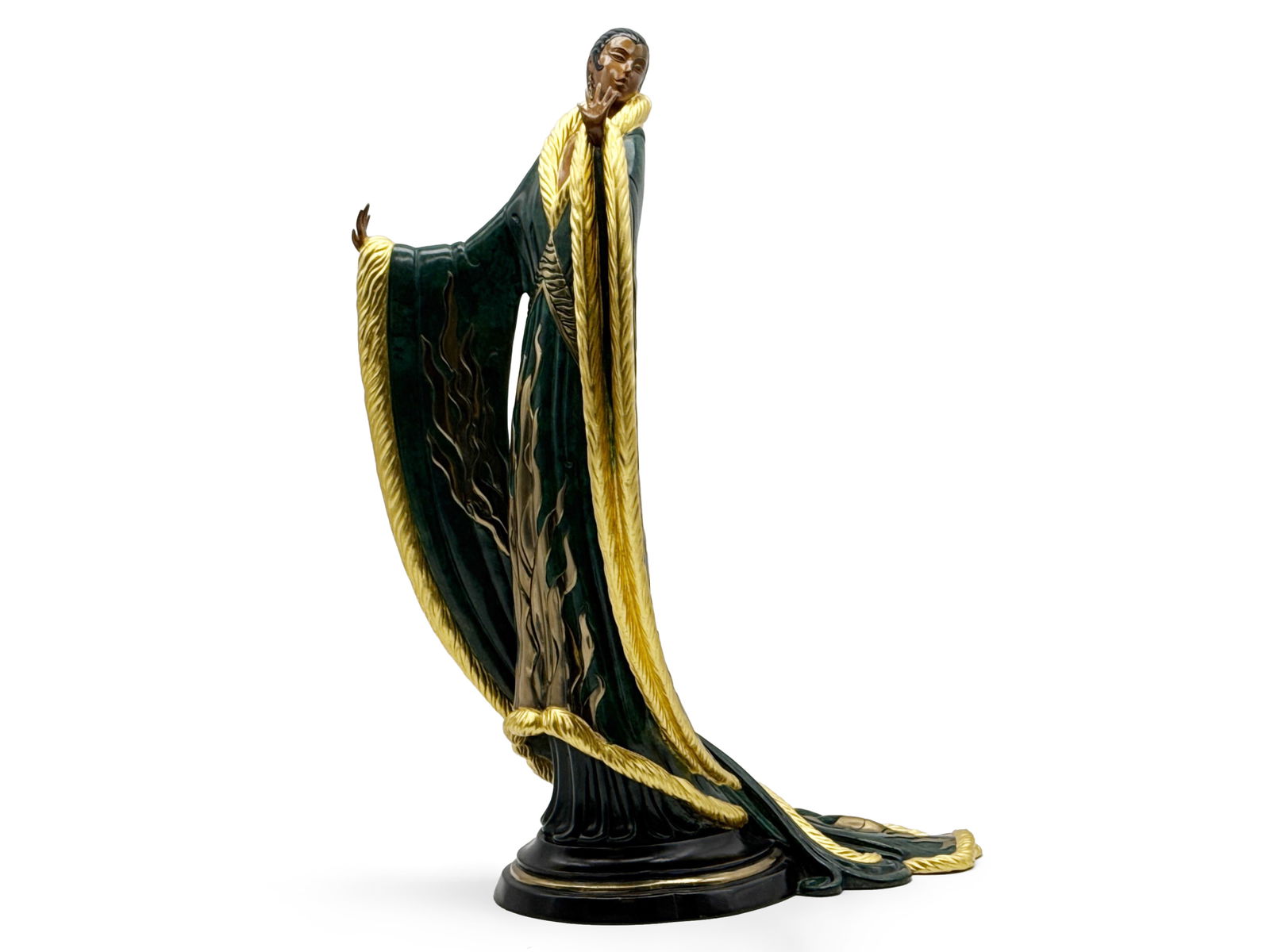 Erté Polychrome Bronze: Femme De Luxe: Erté (Romain de Tirtoff; French, 1892-1990). An Art Deco polychrome bronze sculpture titled "Femme de Luxe," depicting an elegant woman in a flowing robe. Impressed Seven Arts Ltd, London mark along