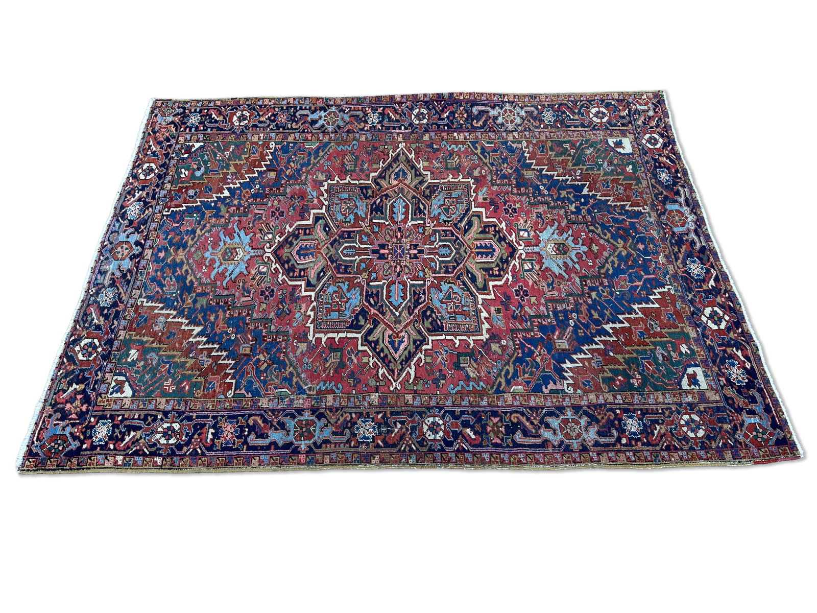 Heriz Carpet, 7ft 8in x 10ft 4in: A Persian Heriz room-size carpet with a medallion center. 7ft 8in x 10ft 4in. | You have additional shipping options, and are not required to use Live Shipping. Additional third-party shipper details;
