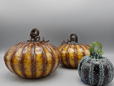 Three Art Glass Pumpkins