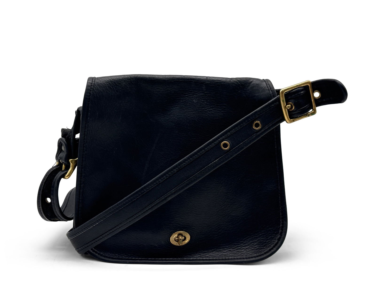 Coach Stewardess Black Leather Purse: A Coach Stewardess bag having gold tone hardware. Style number 9525. Interior is marked with serial number L9C-9525. 9 in tall x 10 in wide. | You have additional shipping options, and are not require