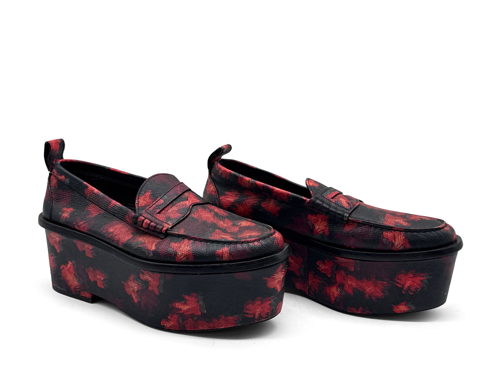 Givenchy Abstract Platform Loafers: A pair of Givenchy platform loafers having floral abstract design. Marked Givenchy on interior and on the sole. Made in Italy. Marked size 40. 5-1/2 in tall x 10-1/2 in wide. | You have additional shi