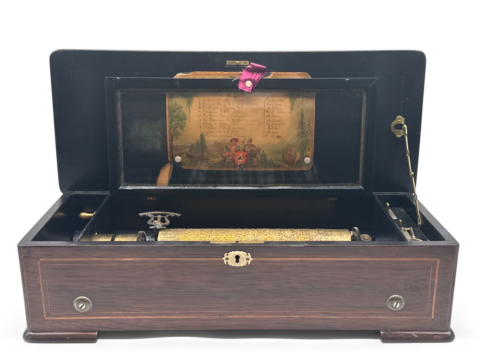 Swiss Cylinder Music Box: A Swiss cylinder music box, 10 tune, having an inlaid case. 6 in tall x 22 in wide. | You have additional shipping options, and are not required to use Live Shipping. Additional third-party shipper de