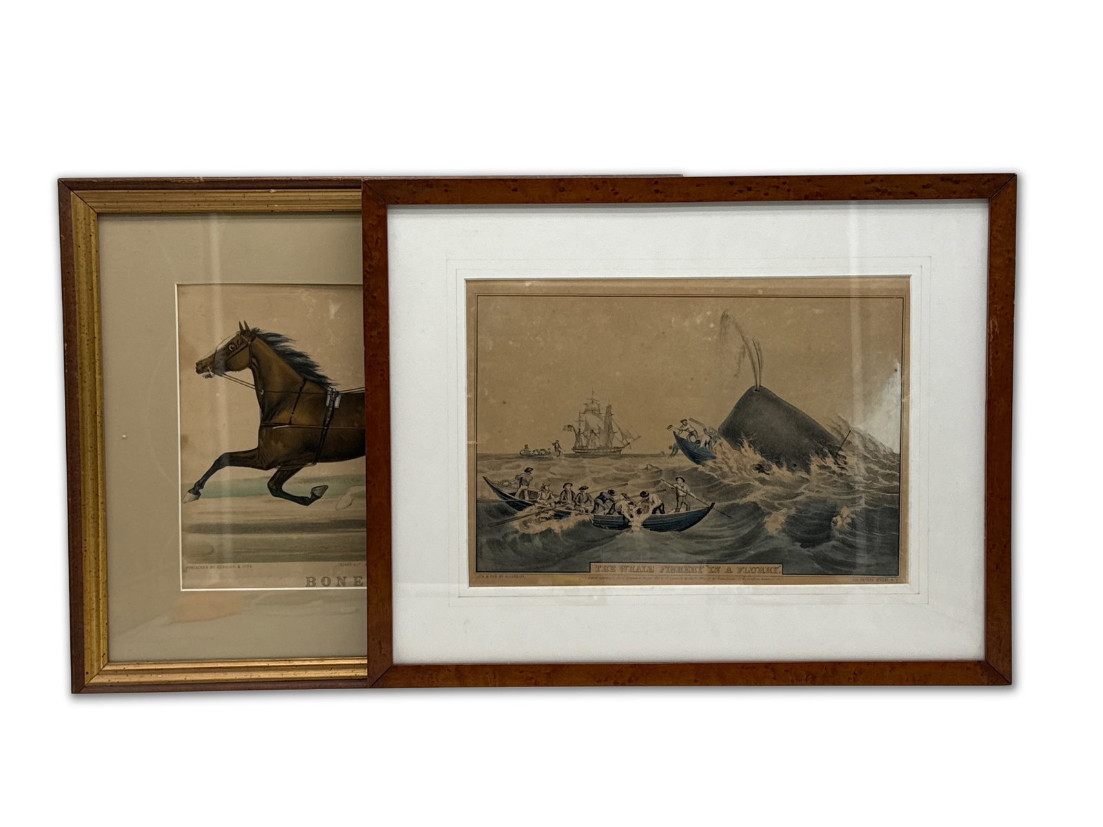 Two Currier & Ives Lithographs: A grouping of two Currier & Ives hand-colored lithographs to include "The Whale Fishery In A Flurry" and "Bonesetter". Both framed under glass. Bonesetter mat opening measures 9-1/4 in x 12-1/4 in. Ou