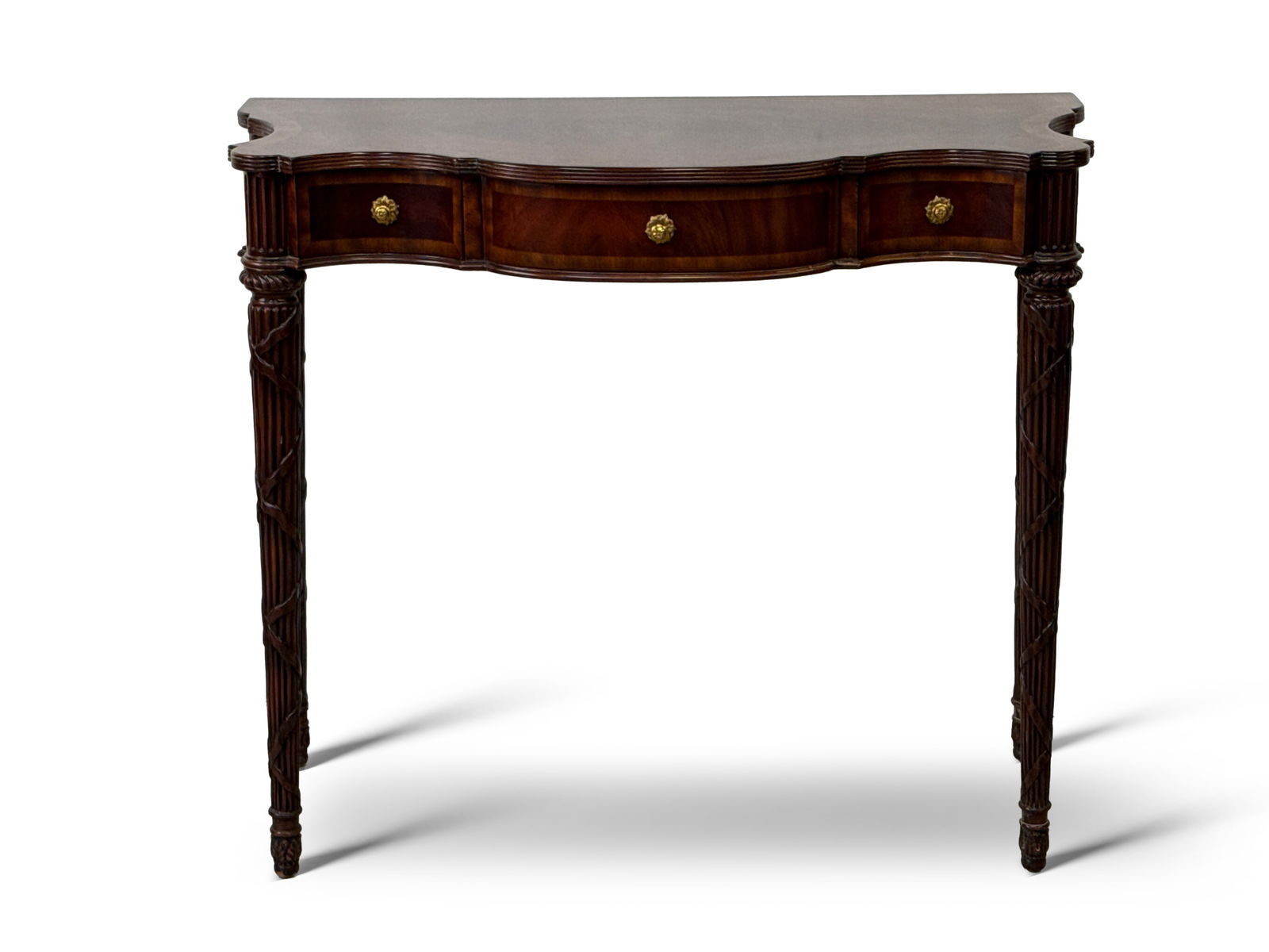 Maitland Smith Federal Style Flame Mahogany Three-Drawer Console Table: A Maitland Smith Federal style three drawer console table raised on carved and reeded tapering legs. 34 in tall x 40 in wide x 19 in deep. | You have additional shipping options, and are not required