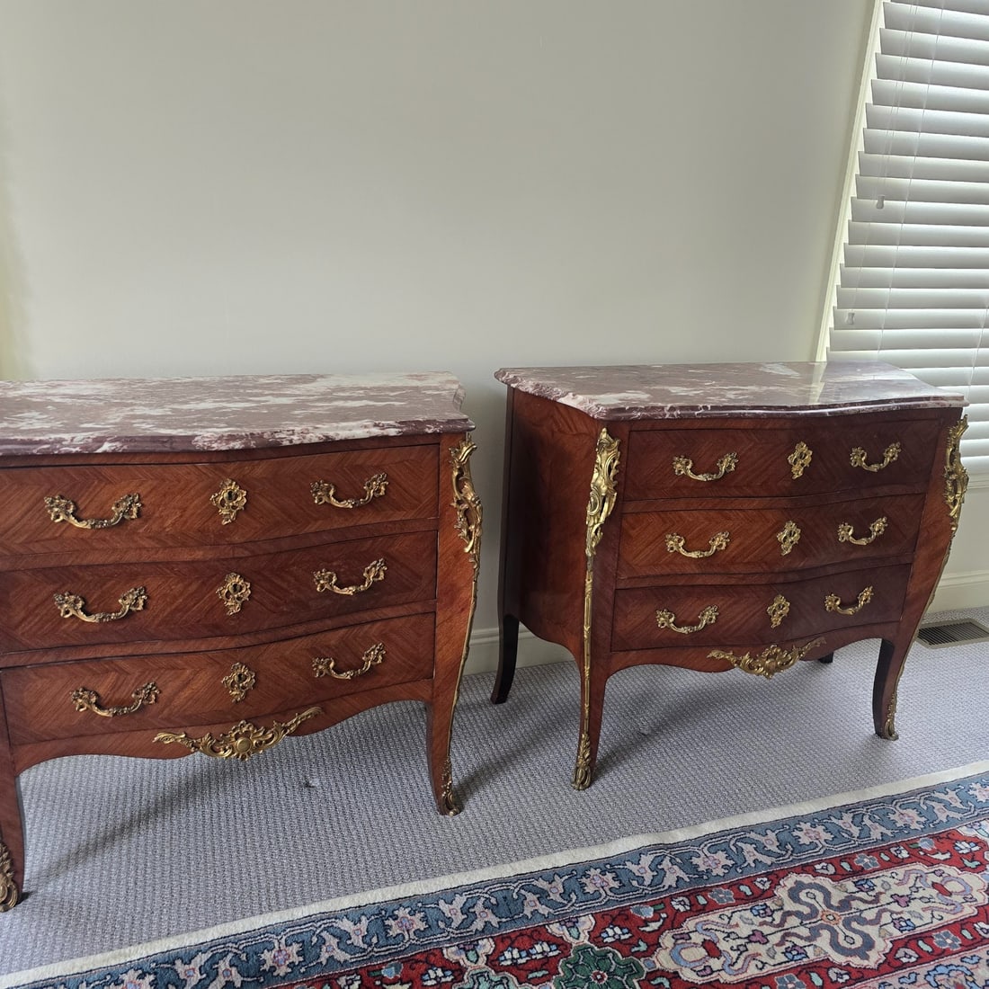 Pair of French Louis XV Style Marble Top Commodes: A pair of French Louis XV style marble tops commodes or chests having three drawers with ormolu mounts, each raised on cabriole legs. 33in tall x 38-1/2in wide. | You have additional shipping options,