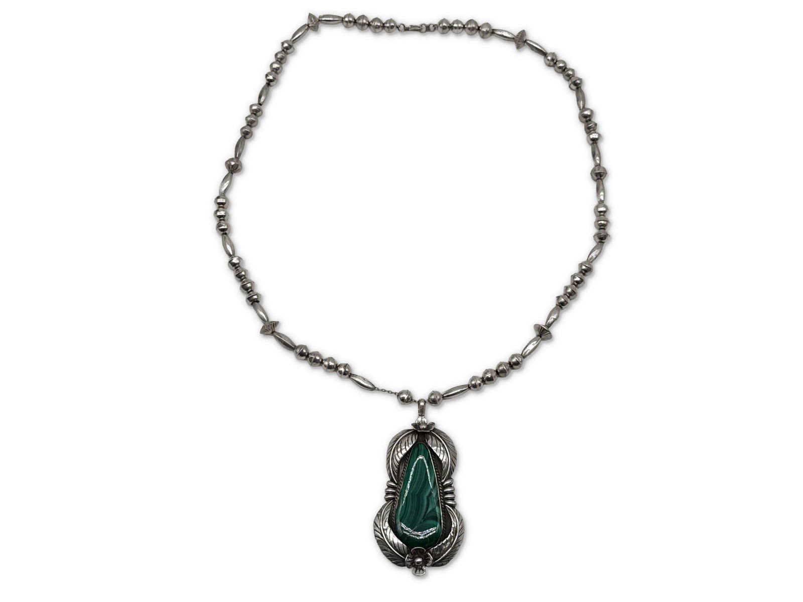 Navajo Silver Malachite Necklace: A Navajo silver beaded necklace with a malachite stone and silver naja pendant. Signed Vera. Necklace: 27 in long. Pendant: 3 in tall x 2 in wide. 42.9 dwt. | You have additional shipping options, and