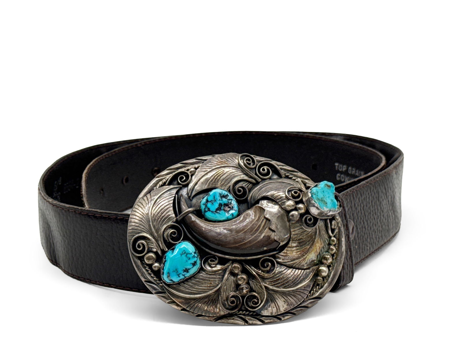K. Mtz Native American Sterling And Turquoise Belt Buckle: A K. Mtz Sterling silver belt buckle having turquoise inset stones and bear claw. Belt is size 34-36. Belt buckle: 65.5 dwt. | You have additional shipping options, and are not required to use Live Sh