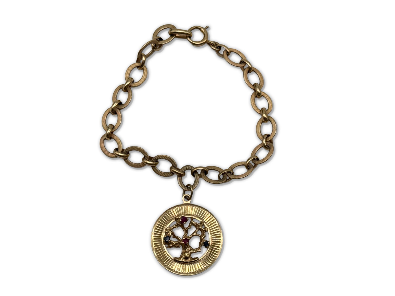 14K Yellow Gold Link Bracelet With Gemstone Tree Charm: A 14K yellow gold chain bracelet with a tree form-charm with gemstones. 8.6 dwt. Charm: 1in tall x 1in wide. Chain: 7in long. | You have additional shipping options, and are not required to use Live S