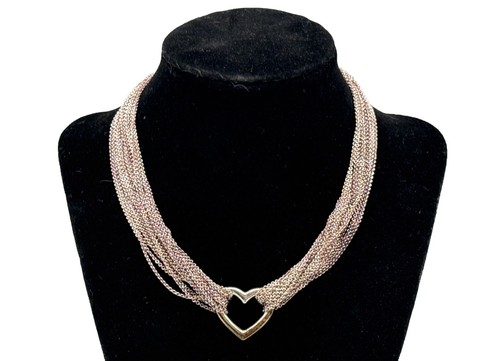Tiffany & Co. Elsa Peretti Open Heart Sterling Necklace: An Elsa Peretti for Tiffany & Co. sterling silver multi-strand necklace with open heart charm. Necklace is marked .925 Tiffany & Co. Includes Tiffany & Co. navy-blue satin-lined case and original Tiff