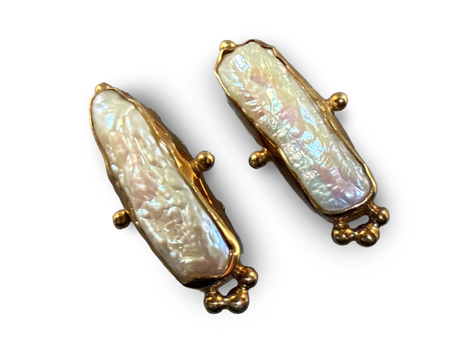 Pair of 18K Yellow Gold Baroque Pearl Earrings: A pair of 18K yellow gold baroque pearl earrings, later fitted as clip-ons. Frames marked 18K. Clips marked 585 but not tested for gold content. 8.37 dwt. 1-3/8in long. | You have additional shipping