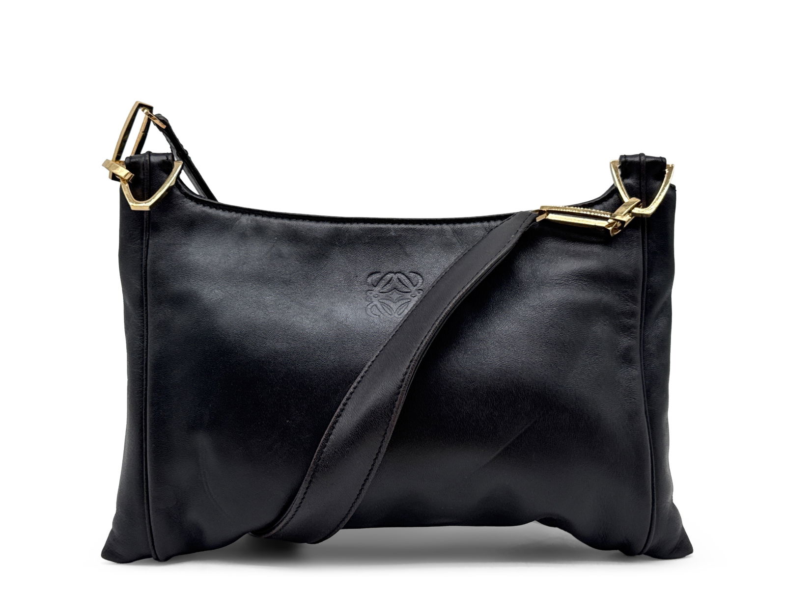 Loewe Napa Anagram Shoulder Bag: A Loewe black leather Napa Anagram shoulder bag with gold tone geometric hardware. Marked Loewe on interior. Includes original Loewe dust bag. 7in tall x 10in wide. | You have additional shipping