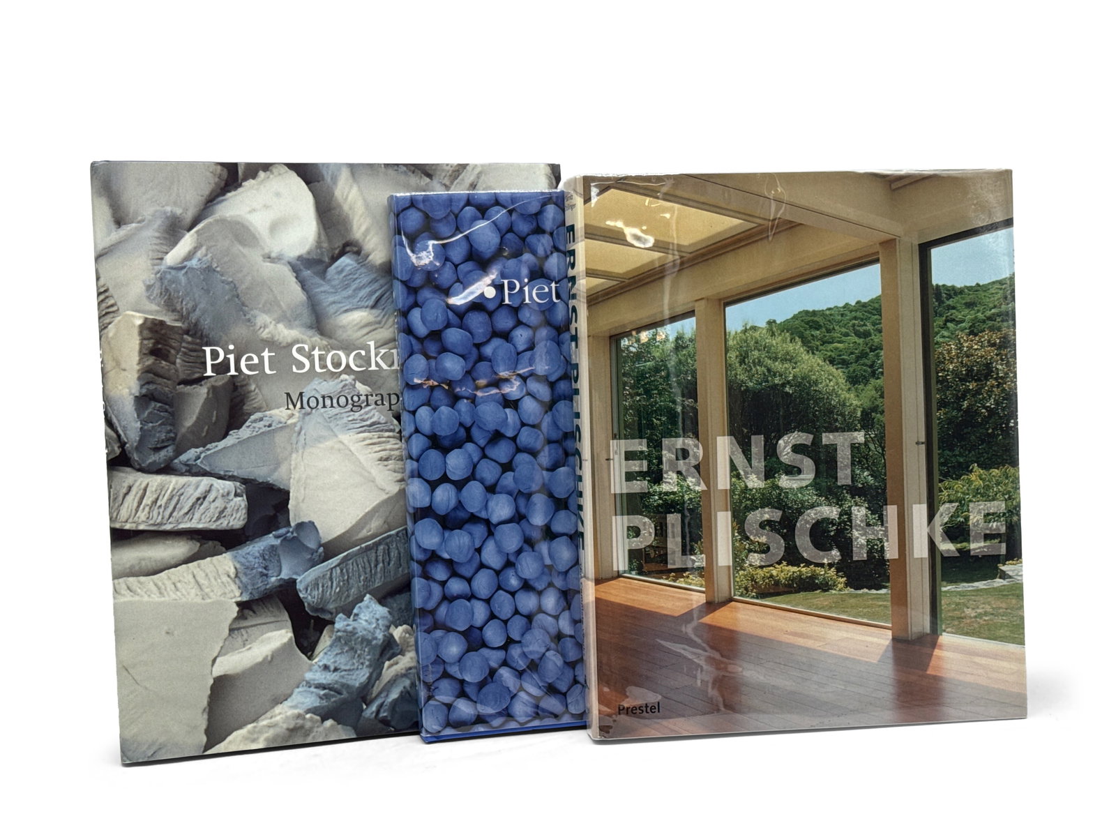 Three Piet Stockmans and Ernest Plischke Design Books: Three design books to include "Ernst Plischke" by Presetl, "Piet Stockmans" by Lennon, and "Piet Stockmans Monograph". Provenance: From the collection of Dr. John Shea of Philadelphia, PA. Largest: