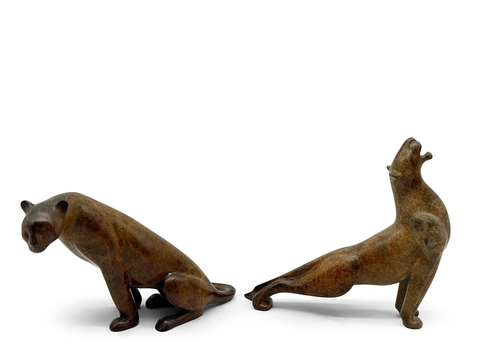 Two Loet Vanderveen Bronzes: Lionesses: Loet Vanderveen (Dutch, 1921-2005). Two bronze lioness sculptures. Each signed Loet and numbered 157/750 and 78/750. Includes Certificate of Authenticity. Larger: 7in x 7in. | You have additional ship