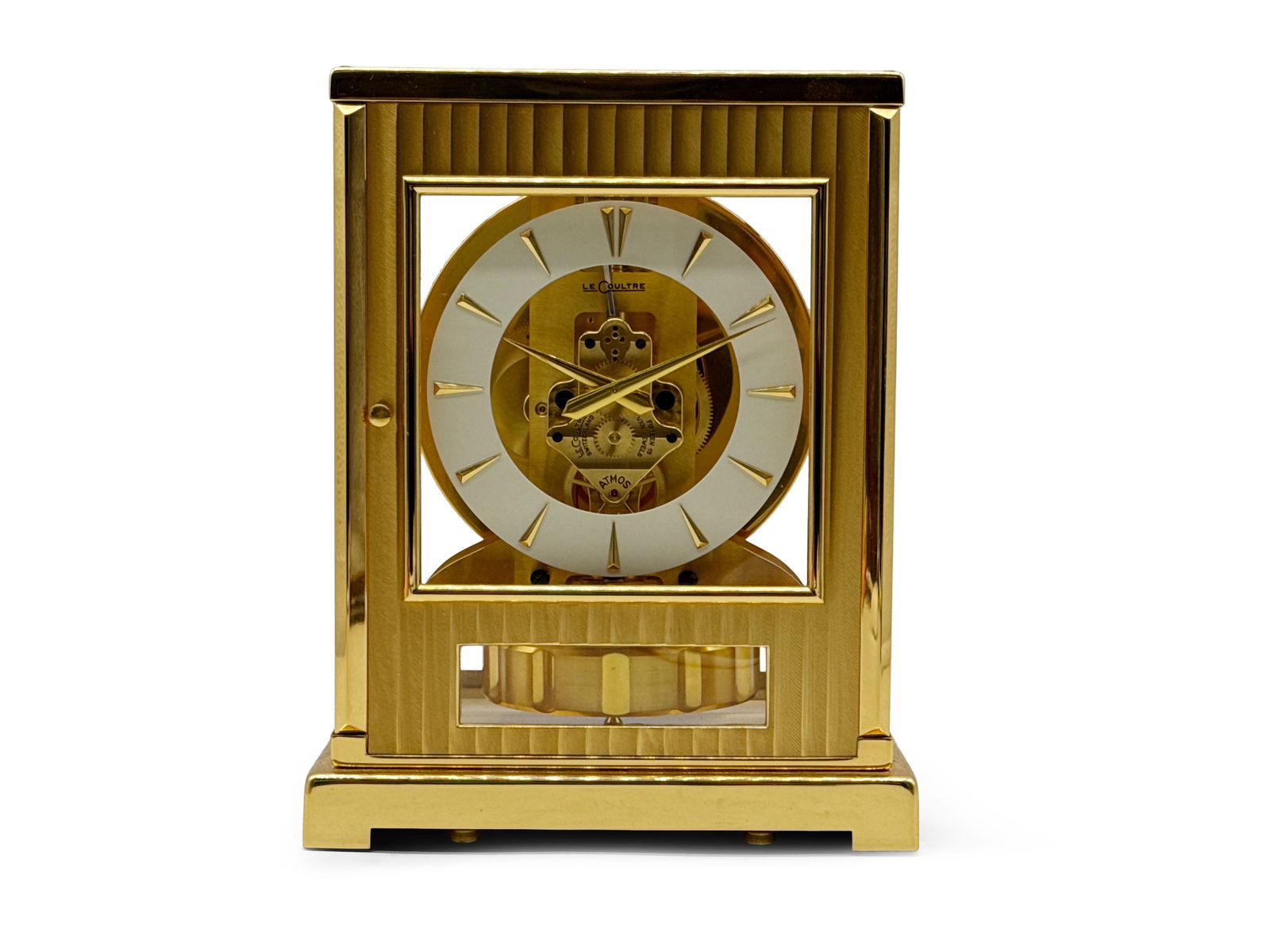 LeCoultre Atmos Tuxedo Mantel Clock: A LeCoultre Atmos "Tuxedo" brass shelf or mantel clock. Serial no. 63023. Provenance: From the collection of Dr. John Shea of Philadelphia, PA. 9in tall x 7in wide x 5-1/4in deep. | You have