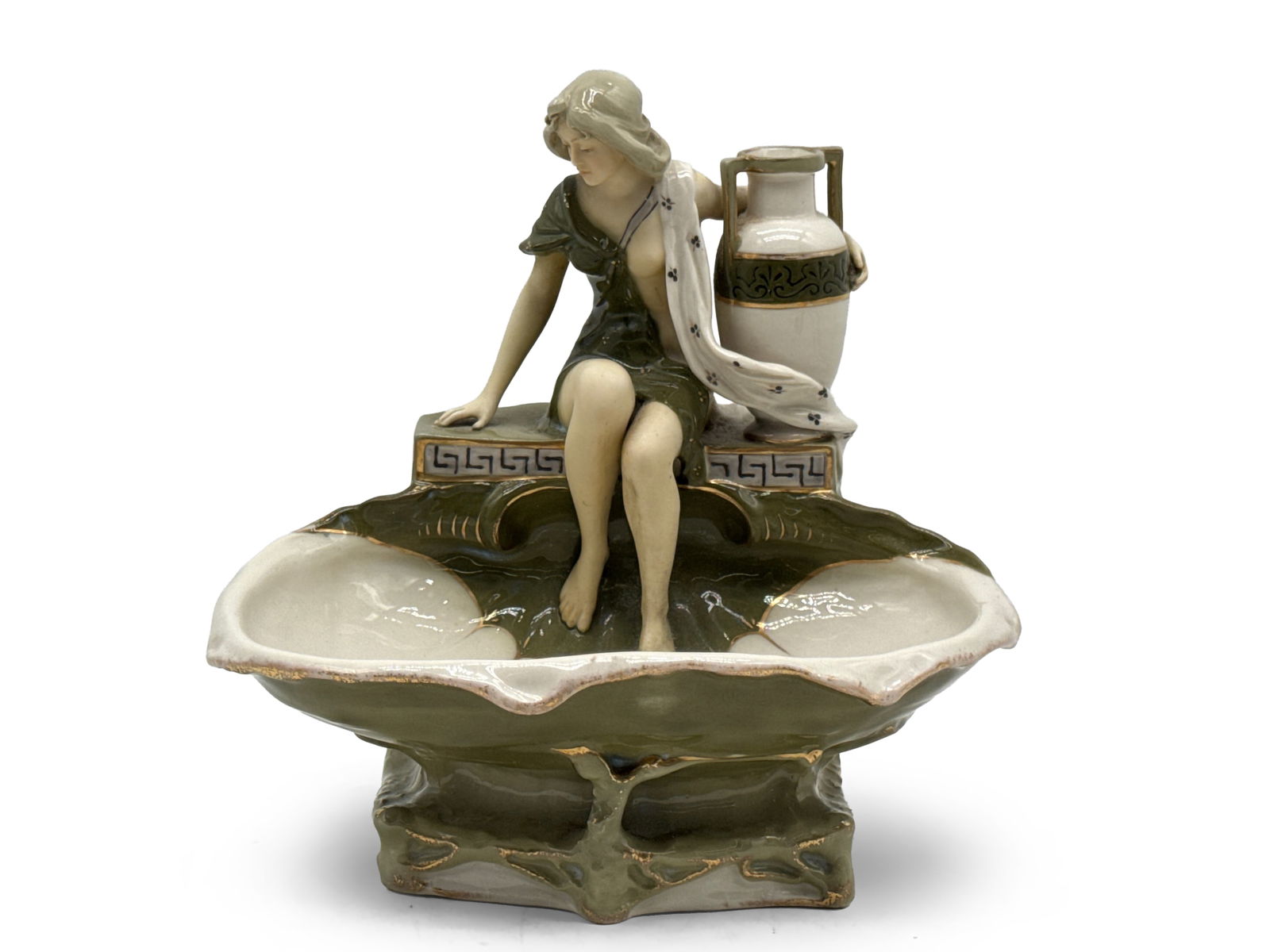 Royal Dux Bohemia Figural Bowl: A Royal Dux Bohemia Neoclassical-style figural bowl depicting a woman with urn. Marked. 9in tall x 9in wide. | You have additional shipping options, and are not required to use Live Shipping.
