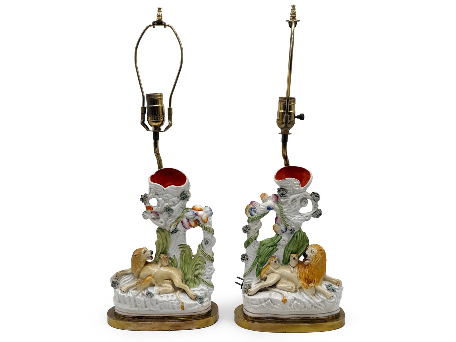 Pr. Staffordshire Snake and Lion Spill Vase Lamps: A pair of Staffordshire lion and lioness spill vase lamps with a snake looming over the cubs. Vase: 11in tall x 7in wide. | You have additional shipping options, and are not required to use Live