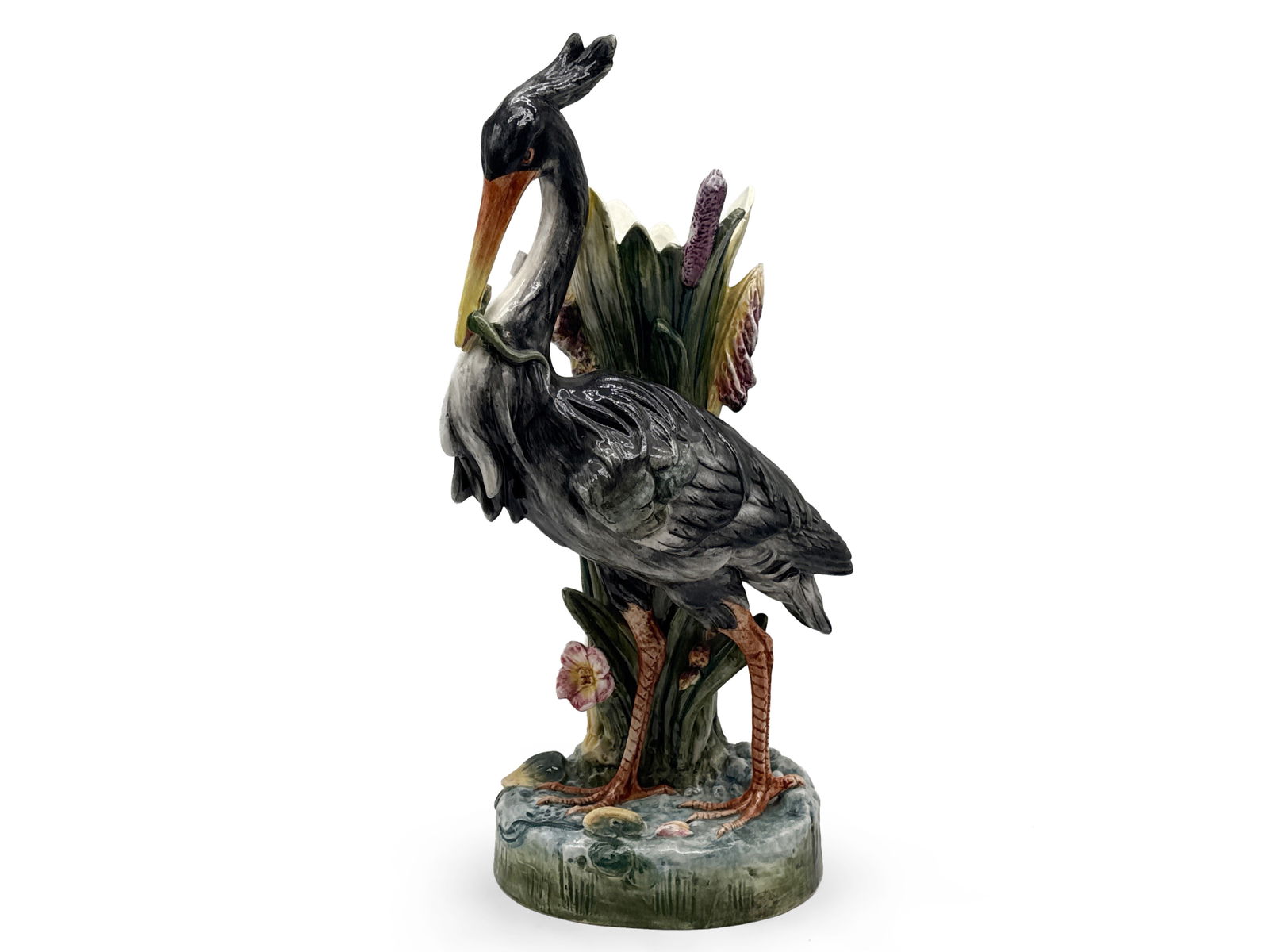 Large Majolica Heron Figural Vase: A large polychrome-painted Majolica heron-form vase. Numbered on bottom. 21-1/2in tall x 11in wide. | You have additional shipping options, and are not required to use Live Shipping. Additional third-