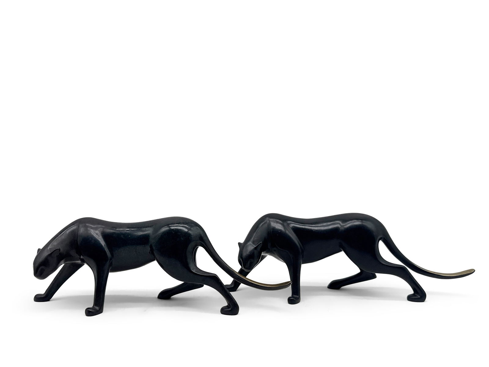 Two Loet Vanderveen Bronzes: Panthers: Loet Vanderveen (Dutch, 1921-2005). Two panther-form bronze sculptures. Signed Loet, numbered 347/750 and 279/750. One certificate of authenticity via Brielle Galleries. 4in x 11in. | You have additio