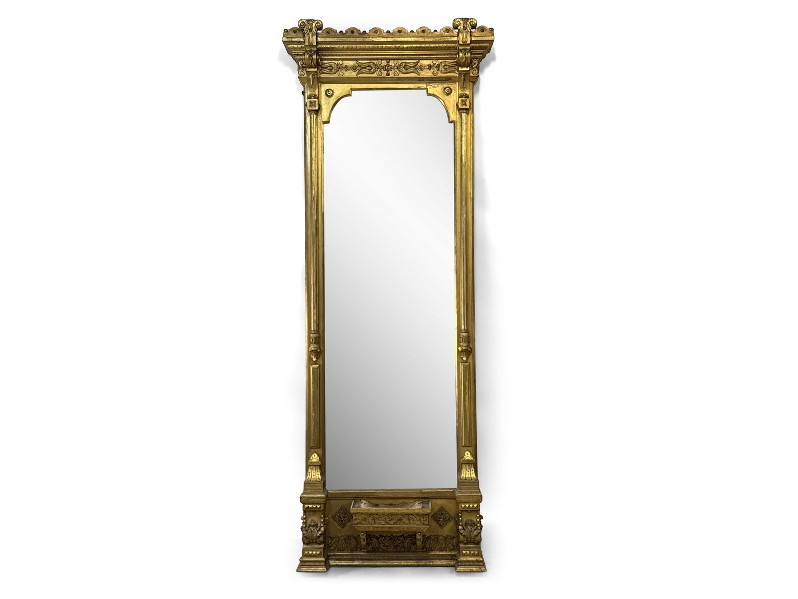 Victorian Giltwood Pier Mirror: A Victorian carved giltwood pier mirror. 104in tall x 34in wide. | You have additional shipping options, and are not required to use Live Shipping. Additional third-party shipper details;