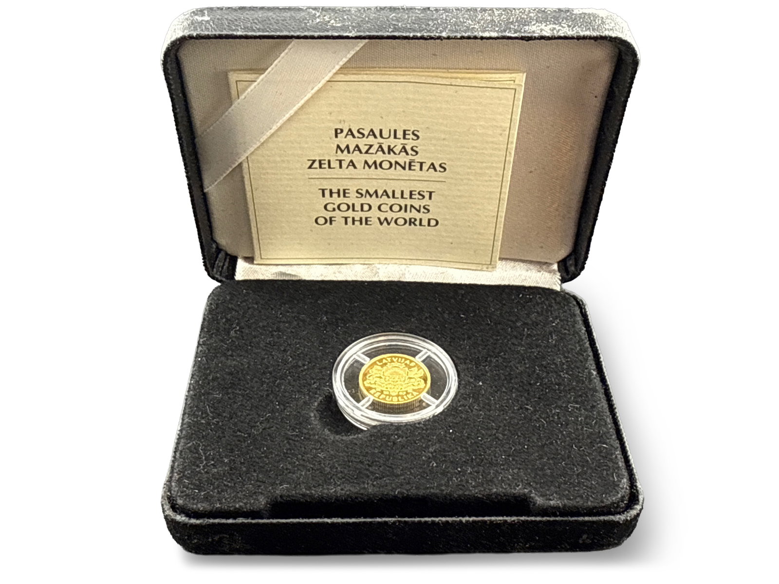 1997 Latvia 10 Latu Gold Coin: A 1997 Latvian 10 Latu gold coin with case. | You have additional shipping options, and are not required to use Live Shipping. Additional third-party shipper details; Philadelphia metro area delivery;