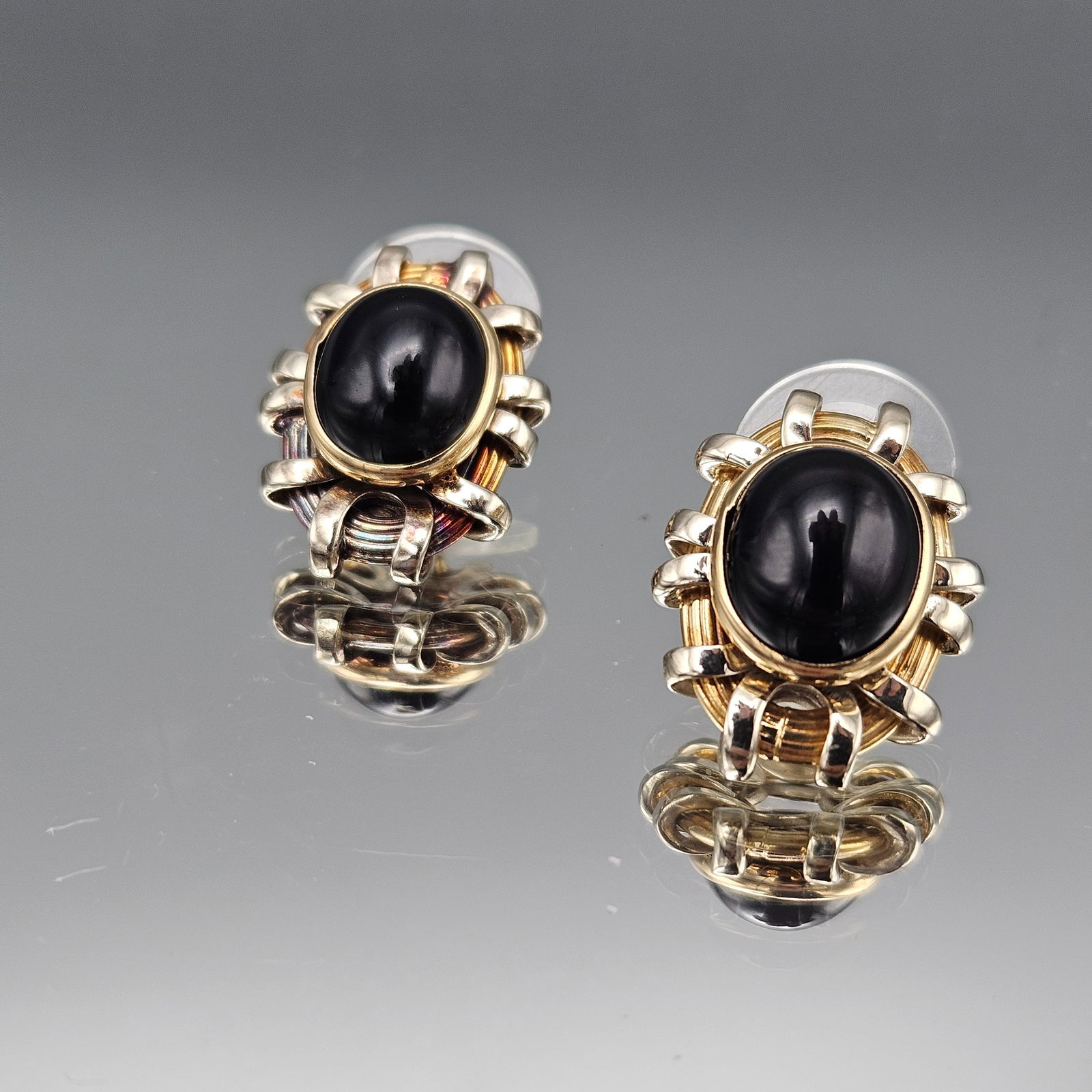 14K Gold and Black Onyx Earrings: A pair of 14K yellow gold and black onyx post-back earrings. 6.51 dwt. | You have additional shipping options, and are not required to use Live Shipping. Additional third-party shipper details; Philad