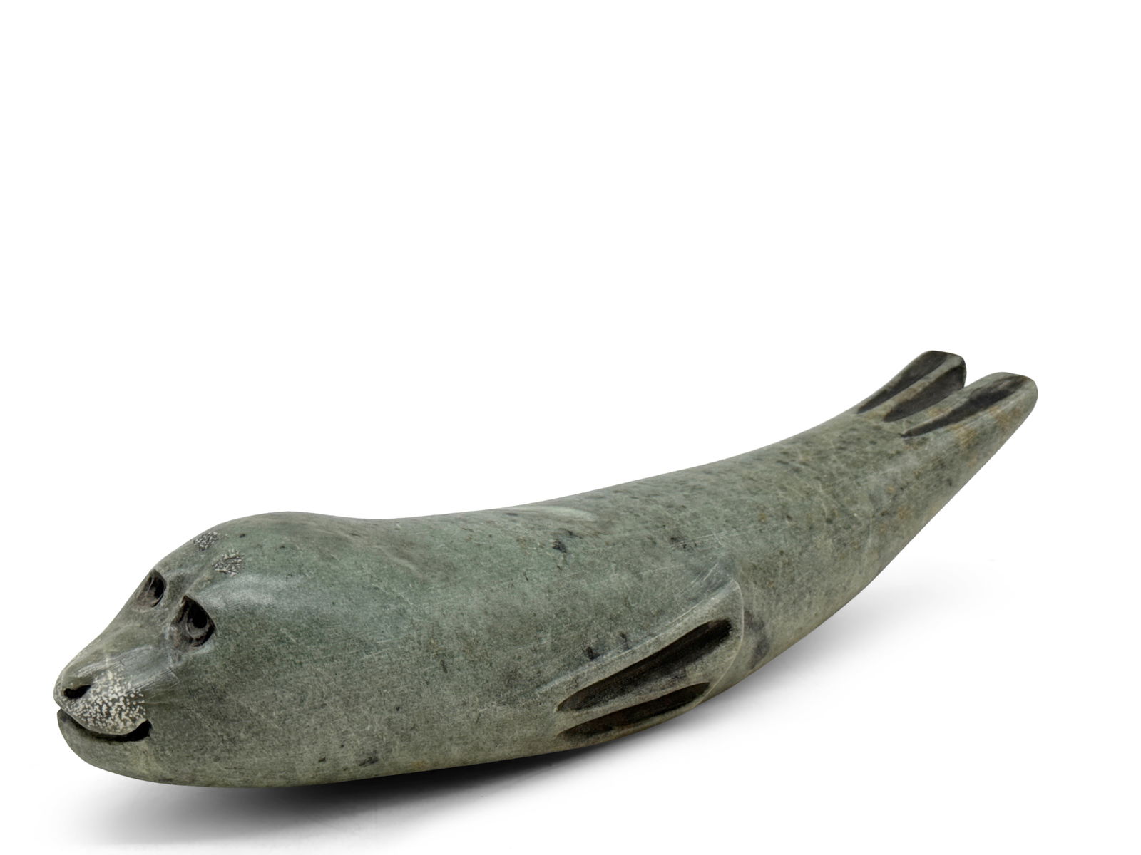 Glenn Heath Soapstone Seal Sculpture: A Glen Heath carved green soapstone seal sculpture. Signed and dated. 3in tall x 10in wide. | You have additional shipping options, and are not required to use Live Shipping. Additional third-party sh