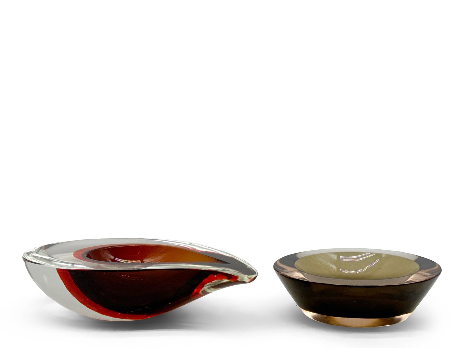 Seguso Vetri D'Arte Murano Bowl and Teardrop Vessel: A signed Seguso Vetri D'Arte smoked amber Murano glass bowl and an orange Murano glass teardrop-shaped vessel. Larger: 2-1/2in tall x 9-1/2in wide. | You have additional shipping options, and are not