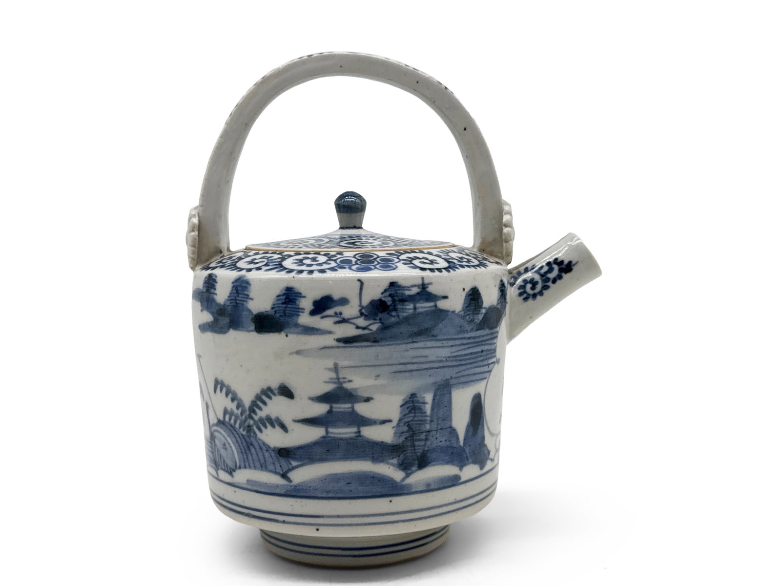18th C. Japanese Blue and White Sake Container: An 18th C. blue and white sake container with genre scene and spiral painted design on lid. 8in tall x 6in wide. | You have additional shipping options, and are not required to use Live Shipping. Addi