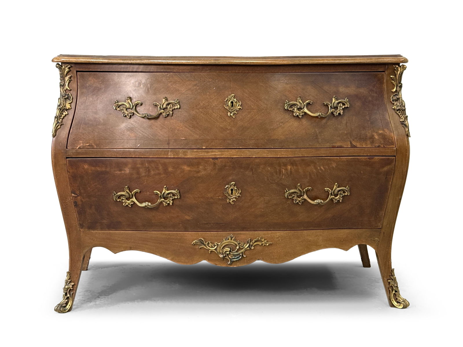 French Louis XV-style Bombe Chest: A French Louis XV-style bombe chest of two drawers with ormolu mounts. 33in tall x 47in wide x 24in deep. | You have additional shipping options, and are not required to use Live Shipping. Additional