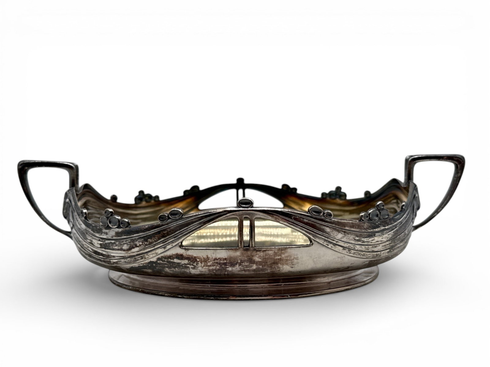 Orivit Art Nouveau Sterling Silver Handled Dish: An Orivit early 20th C. Art Nouveau sterling silver handled dish with flowing lines and circular accents. Hallmarked and marked Sterling Silver, numbered 48. 2-1/2in tall x 8-1/2in wide. 13.39 ozt. |