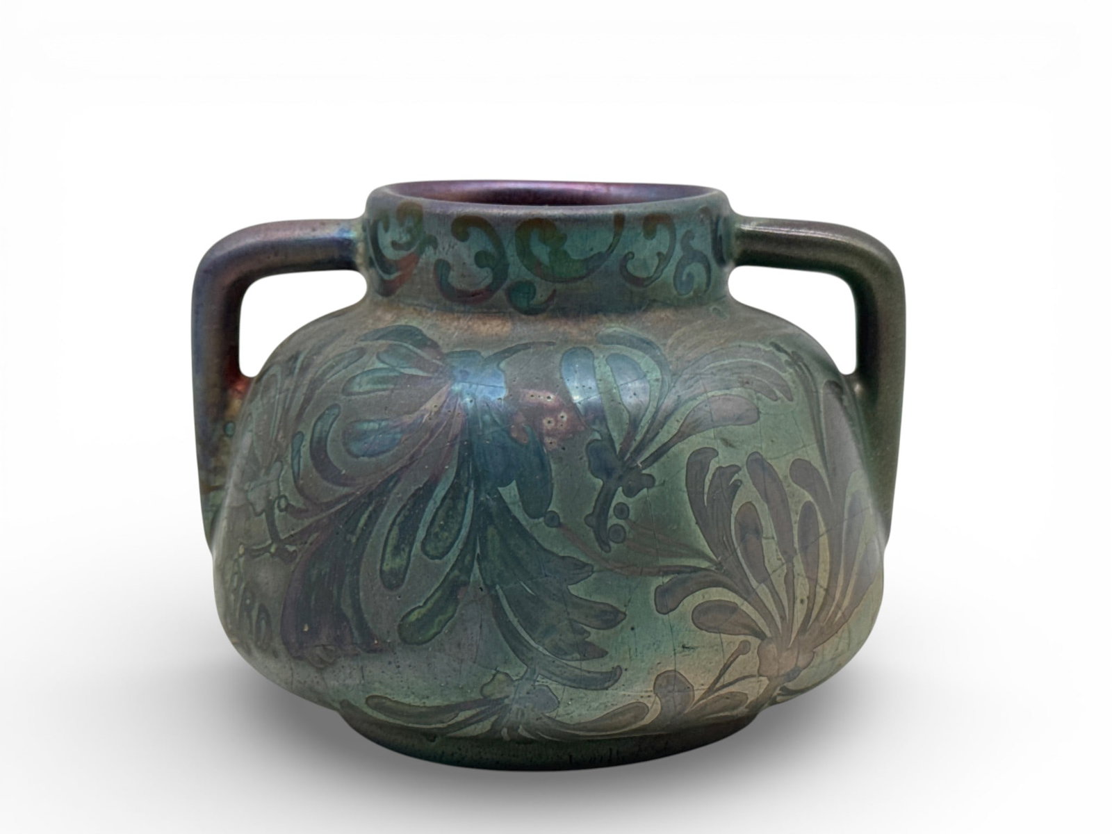 Jacques Sicard for Weller Handled Vase: A Jacques Sicard for Weller diminutive handled vase with an iridescent Art Nouveau design. Signed. 3-1/2in tall x 4in wide. | You have additional shipping options, and are not required to use Live Shi