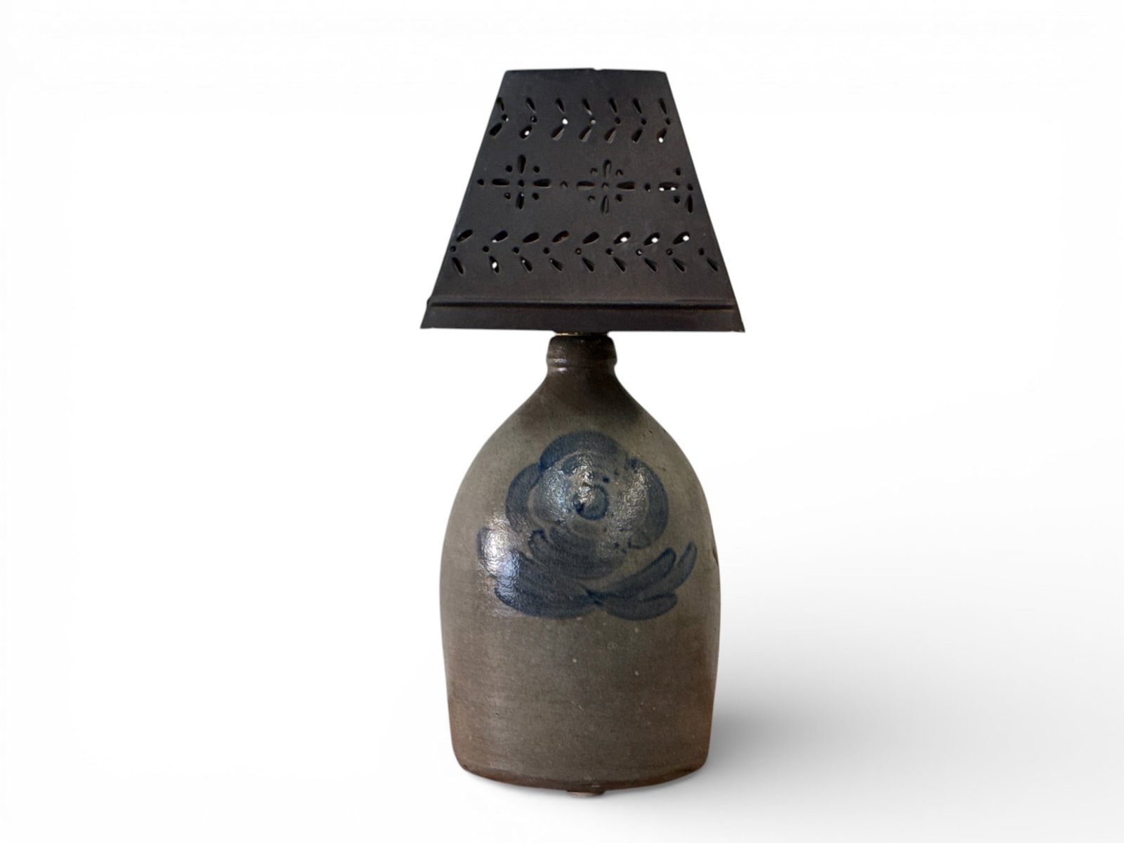 Stoneware Jug-Form Table Lamp: A stoneware jug-form table lamp with a blue touch decorated floral design and a pierced tin lampshade. Jug: 11-1/4in tall. Lamp: 18-1/4in tall. | You have additional shipping options, and are not