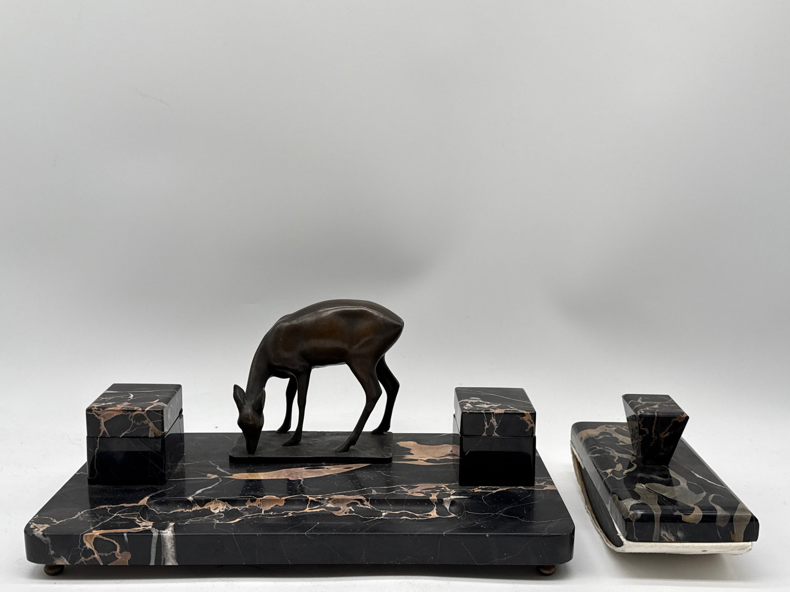 Art Deco Marble and Bronze Grazing Deer Desk Set: An Art Deco marble and bronze desk set and marble blotter with bronze grazing deer. Deer is signed "O. Pflug". 6in tall x 13in wide. | You have additional shipping options, and are not required to