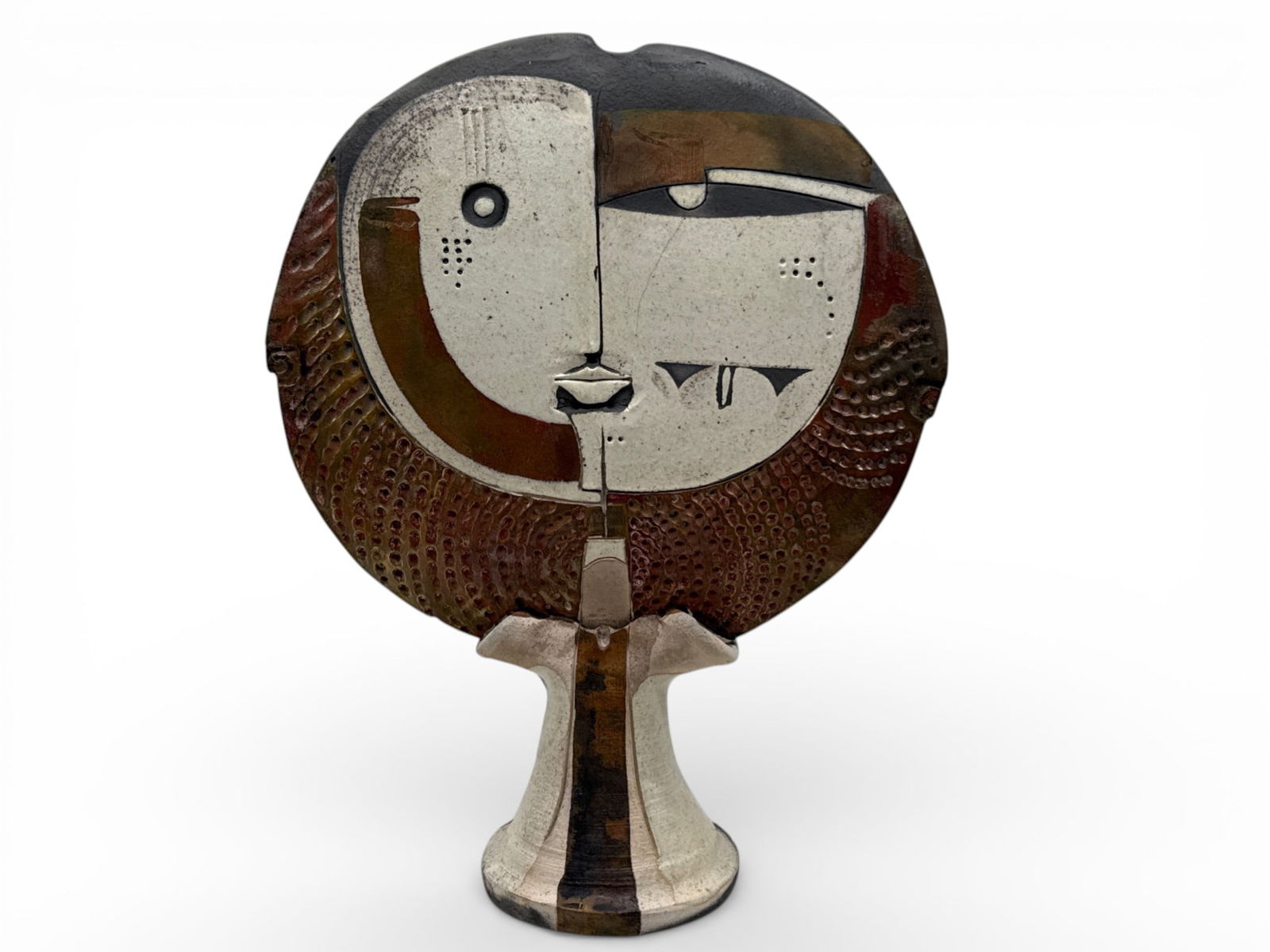 Doug DeLind Raku Pottery Cubist Sculpture: Doug DeLind (American, b. 1947). A Raku fired Cubist-style ceramic sculpture with painted face. Signed verso. 17in tall x 12in wide. | You have additional shipping options, and are not required to use