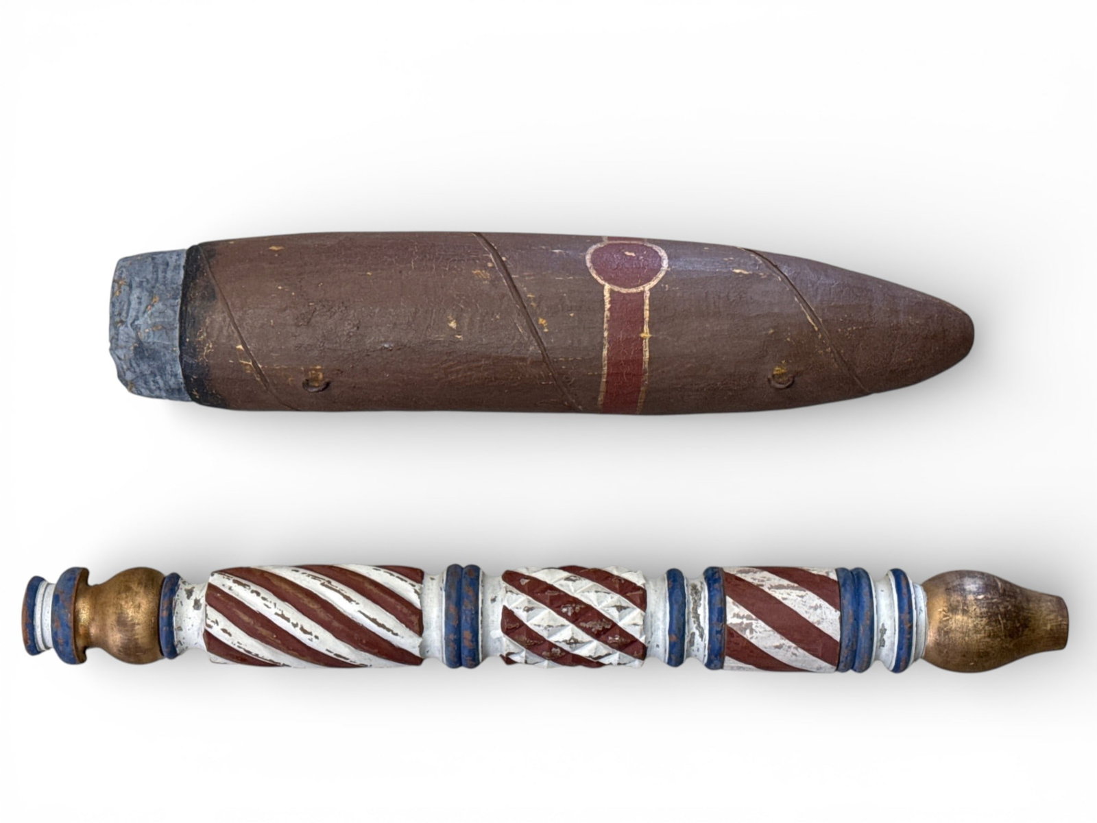 Cigar and Barber Carved and Painted Trade Signs: Two carved and painted trade signs to include a tobacconist cigar and a barber pole. Each with branded marks for Burton. 29in tall x 3in wide. Cigar: 23in tall x 4-1/2in wide. | You have additional sh