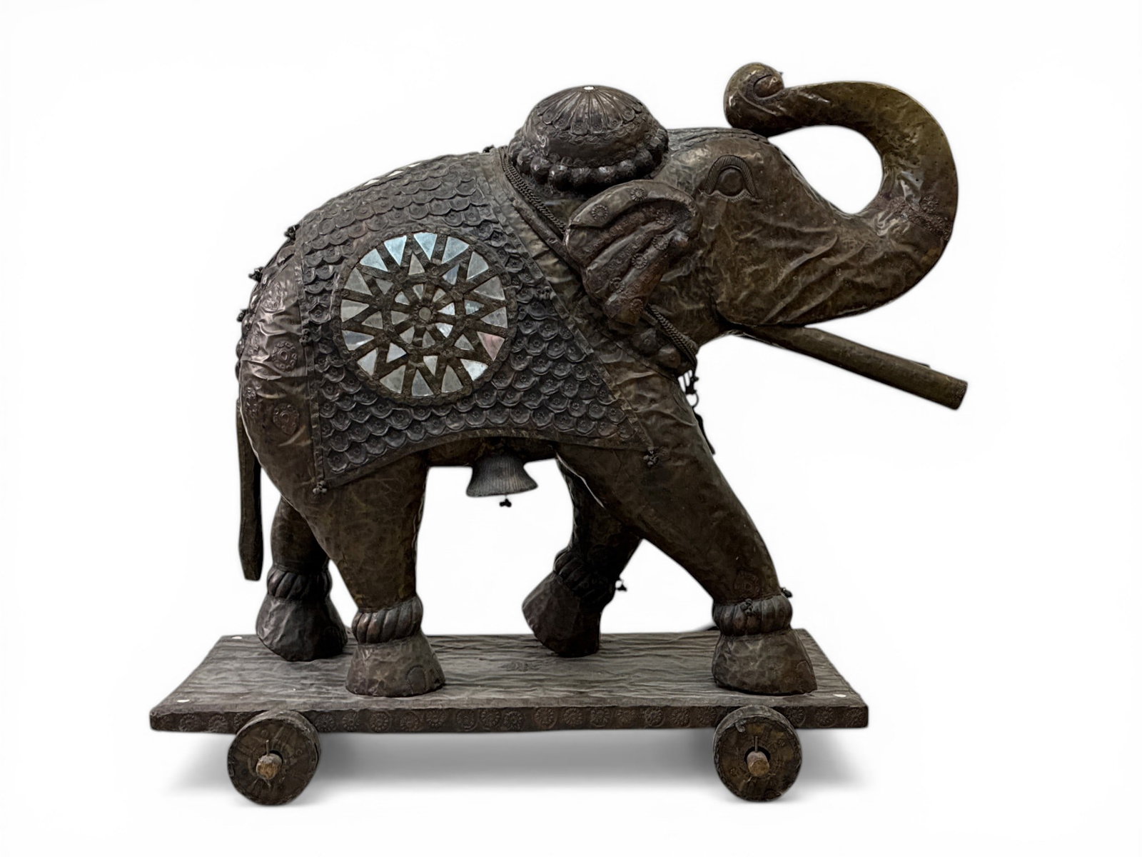 Monumental Indian Elephant Statue: A monumental Indian metal-wrapped sculpture of an elephant on a wheeled base. 43in tall x 48in wide x 24in deep. | You have additional shipping options, and are not required to use Live Shipping. Addi