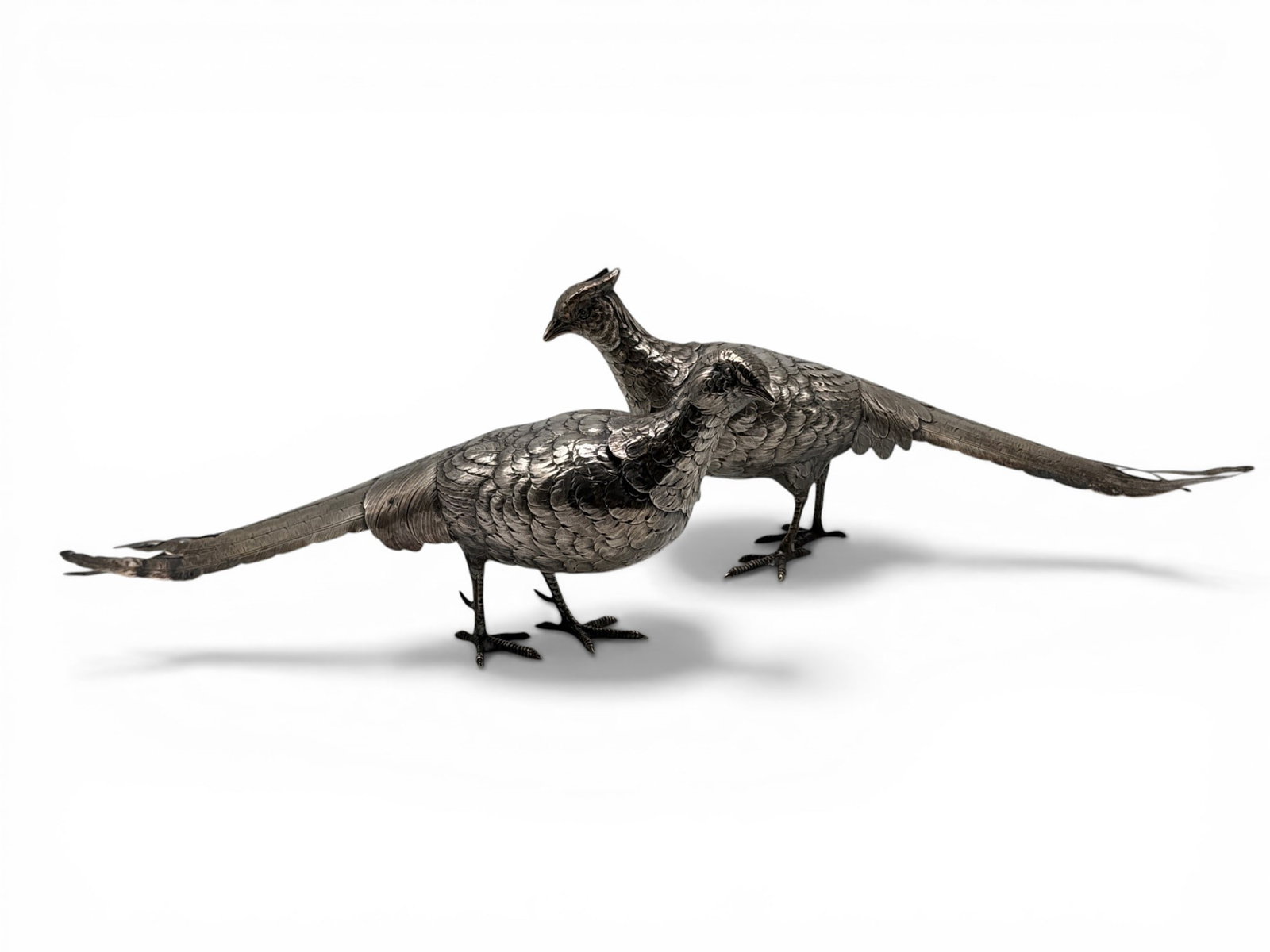 Pair of Continental Silver Pheasant Table Ornaments: A pair of Continental silver pheasant table ornaments with removable heads. Hallmarked. Taller: 6-3/8in tall x 16in wide x 3-1/2in deep. 23.7 ozt total. | You have additional shipping options, and are