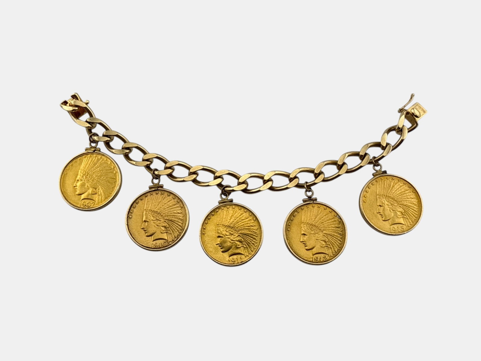 Charm Bracelet with Five U.S. Gold Coins: A 14K yellow gold chain link bracelet with five United States Indian Head $10 gold coin charms. Approx. 7-1/4in long. 80.8 dwt. | You have additional shipping options, and are not required to use Live