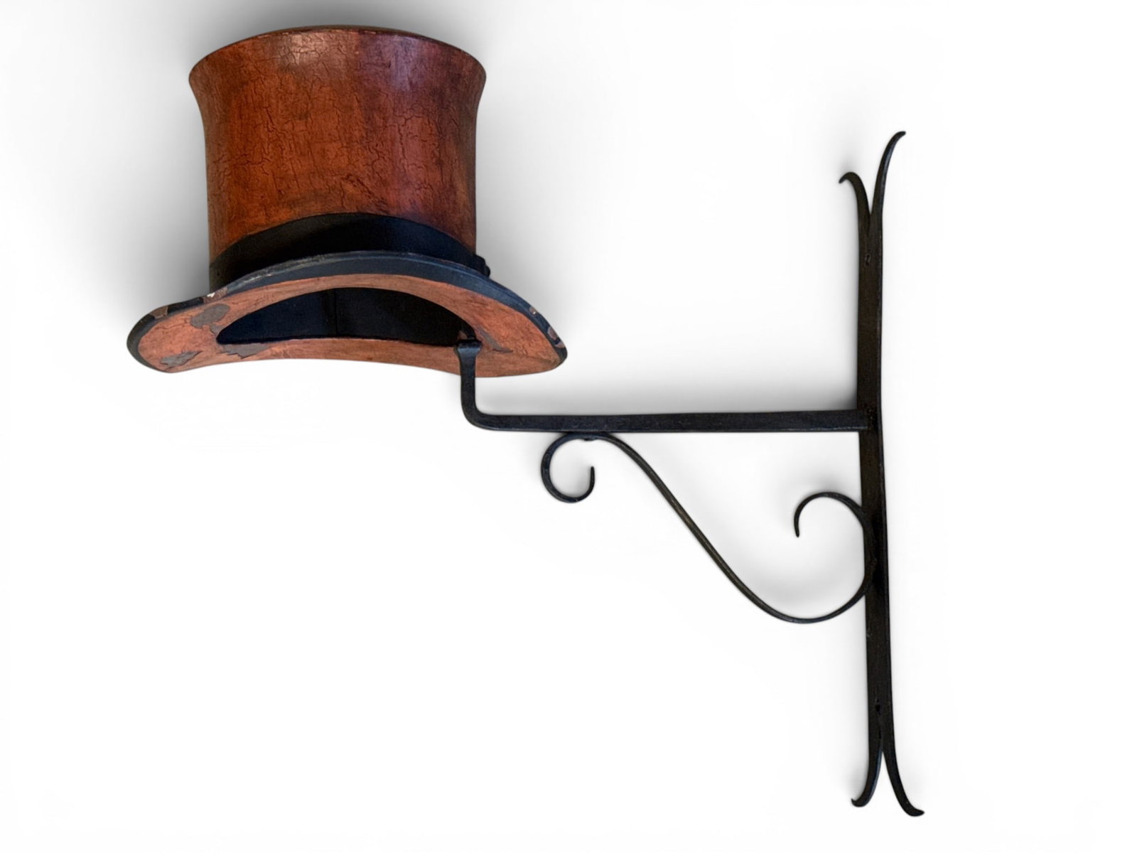 Iron Hatmaker's Trade Sign: A contemporary hatmaker's advertising trade sign with a wrought iron wall-mount frame and painted top hat form. In two pieces.18in tall x 18in wide. | You have additional shipping options, and are not