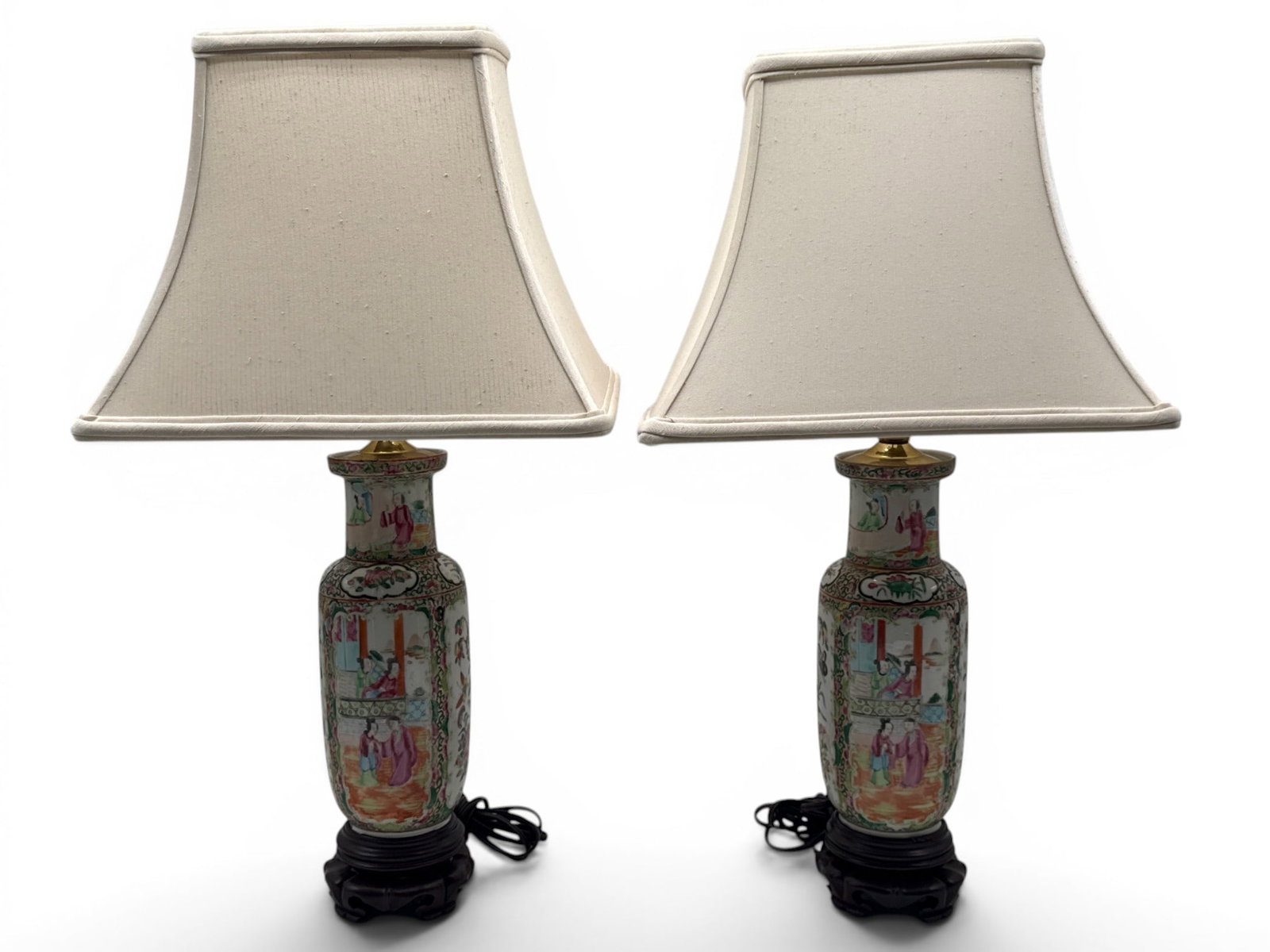 Two Chinese Export Rose Medallion Table Lamps: Two Chinese export rose medallion porcelain vases mounted as table lamps, with hardwood stands. 22in tall x 4in wide. | You have additional shipping options, and are not required to use Live Shipping.