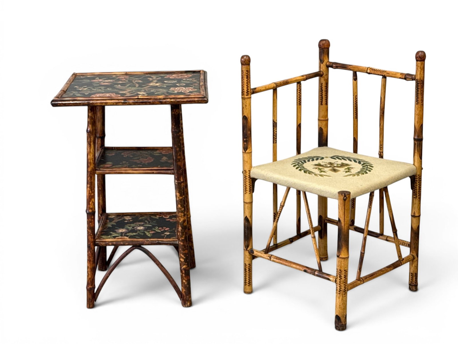 Victorian Bamboo Corner Chair and Stand: A Victorian bamboo corner chair with needlepoint seat and a bamboo stand with three bird- and floral-decorated tiers. Stand: 28in tall x 18-1/2in wide x 18-1/2in deep. Chair: 32in tall x 22in wide. | 